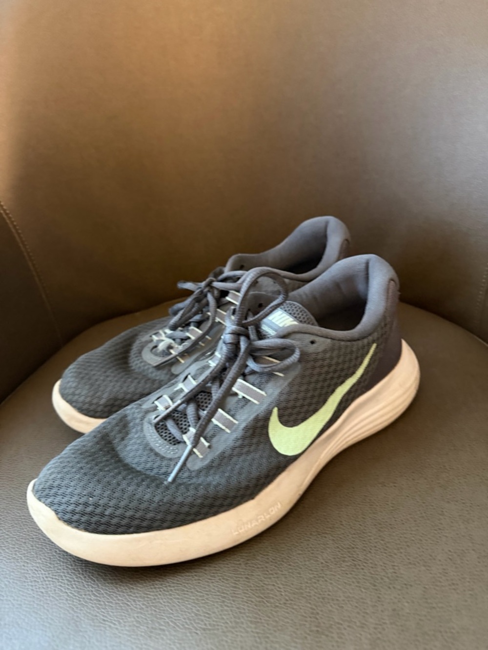 Nike women’s Gray Running Shoes with Light Green Swoosh